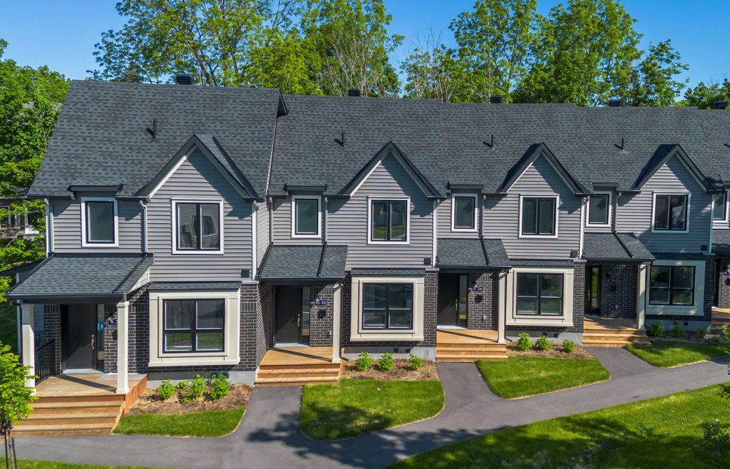 An exterior photo of four of the new townhomes for rent